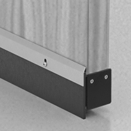 Image of ProductInUse. Flat Weatherstripping Seal Shown Installed. Front orientation. Weatherstripping. Wraparound Bottom-Mount Weatherstripping.