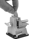 Image of ProductInUse. Front orientation. Vises. Miniature Suction-Mount Bench Vises.