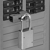 Image of ProductInUse. Shown Installed (Padlock Not Included). Front orientation. Lockouts. Clamp-On Circuit Breaker Lockouts, Style D.