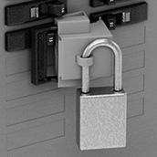 Image of ProductInUse. Lockout Shown Installed (Padlock Not Included). Front orientation. Contains MultipleImages. Lockouts. Clamp-On Circuit Breaker Lockouts, Style C.
