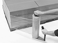 Image of ProductInUse. Front orientation. Stretch Wrap Dispensers. Handheld Stretch Wrap Dispensers , Angled Handle.