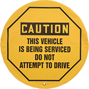 Image of Product. Front orientation. Lockouts. Lockout Steering Wheel Covers, Caution—This Vehicle is Being Serviced Do Not Attempt to Drive (English).