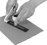 Image of ProductInUse. Front orientation. Gasket Cutters. Utility-Knife Style Circular Gasket and Hole Cutters.
