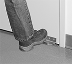 Image of ProductInUse. Foot Pull Handle (Shown Mounted on Door). Front orientation. Pull Handles and Knobs. Arm and Foot Pull Handles, Foot Pull Handles.
