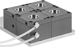 Image of ProductInUse. Four Fixtures (Each Sold Separately). Front orientation. Collet Fixtures. High-Density Air/Hydraulic-Operated Collet Fixtures.