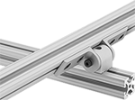 Image of ProductInUse. Perpendicular with L Arms. Front orientation. T-Slotted Framing and Fittings. T-Slotted Framing Brackets, Heavy Duty Pivoting Brackets with Sleeve Bearings for Single Rails, Perpendicular, L Arms.