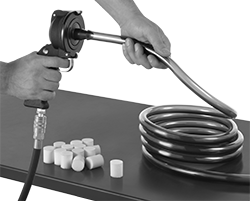 Image of ProductInUse. Front orientation. Tube Cleaners. Air-Powered Tube Cleaners.