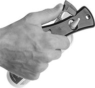 Image of ProductInUse. Squeeze to trim nozzle tip.. Front orientation. Nozzle Cutters.