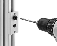 Image of ProductInUse. Front orientation. T-Slotted Framing and Fittings. Drill Jigs for T-Slotted Framing, For Single Rails.