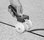 Image of ProductInUse. Insertion Tool with Threaded Handle (Backer Rod Not Included). Front orientation. Backer Rod Insertion Tools. Threaded Handle.