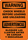 Image of Product. Front orientation. Signs. Plant and Shipping Dock Signs, Warning—Chock Wheels Before Loading and Unloading/Advertencia—Bloquee Las Llantas Antes De Cargar Y Descargar (English/Spanish).