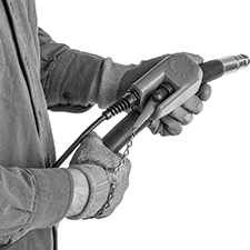 Image of ProductInUse. Toggle Switch Actuator Shown in Use. Side1 orientation. Abrasive Blaster Safety Switches.