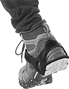 Image of ProductInUse. Back orientation. Ice Cleats. Ice Cleats, Heel Coverage—Adjustable Strap with Hooks.