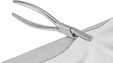 Image of ProductInUse. Front orientation. Fabric-Stretching Pliers.