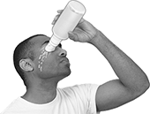 Image of ProductInUse. Saline Sold Separately. Front orientation. Eye Wash Stations. Wall-Mount Directed Stream Supplemental Eye Wash Station.