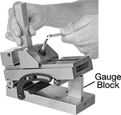Image of ProductInUse. Shown with Gauge Block (Not Included). Front orientation. Contains Annotated. Vises. Sine Vises.