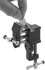 Image of ProductInUse. Front orientation. Vises. Miniature Clamp-On Bench Vises, With Flat Jaws, Fixed Base.