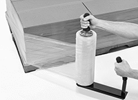 Image of ProductInUse. Front orientation. Stretch Wrap Dispensers. Handheld Stretch Wrap Dispensers , Angled Handle, Wide Base.