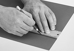 Image of ProductInUse. Front orientation. Rulers. Rulers for Cutting, With Finger Groove.