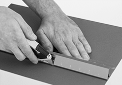 Image of ProductInUse. Front orientation. Rulers. Rulers for Cutting, With Safety Guard.