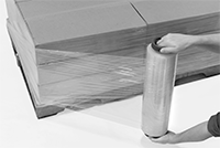 Image of ProductInUse. Front orientation. Stretch Wrap Dispensers. Handheld Stretch Wrap Dispensers , End-Cap Handle.