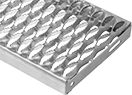 Image of Product. Front orientation. Stair Treads. Metal Plank Grating Stair Treads, Serrated.