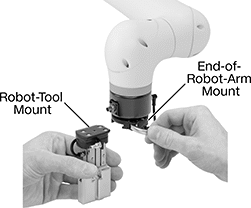 Image of ProductInUse. Front orientation. Contains Annotated. Robot Tool Changers. Robot Tool Changers with Electric and Air Pass-Throughs.