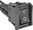 Image of Product. Vertical Line/Circle with Guard and Wire Leads. Front orientation. Rocker Switches. High-Starting-Current Rocker Switches, With Guard, Wire Lead Connection, Not Illuminated, Circle, Vertical Line.
