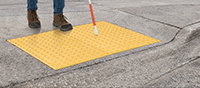 Image of ProductInUse. Plate Shown Installed and in Use. Front orientation. ADA Warning Plates.