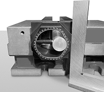 Image of ProductInUse. Indexer with Workpiece Shown in Vise. Front orientation. Rotary Angle Indexers.