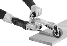Image of ProductInUse. Style A (Contact Wheel Shown in Use). Front orientation. Style A. Electric Belt Sanders for Curved Surfaces.