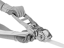 Image of ProductInUse. Push Down to Tighten. Front orientation. Ratchet Straps. Ergonomic Reverse-Action Ratchet Straps.
