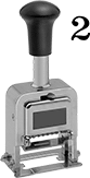 Image of Product. Front orientation. Contains Inset. Stamps. Steel Stamp, Self-Advancing, Self-Inking, Rotating Character.