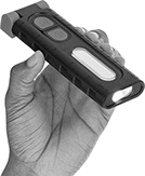 Image of ProductInUse. Style E (Shown Held). Front orientation. Portable Work Lights. Wet-Location Cordless Portable Work Lights, Style E.
