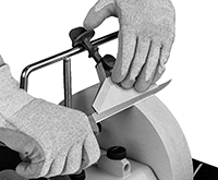 Image of ProductInUse. Front orientation. Blade Sharpeners. Water-Cooled Electric Blade Sharpeners.