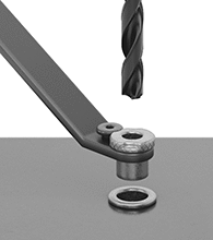 Image of System. Handle Shown Installing Drill Bushing in Fixture Plate. Front orientation. Drill Bushing Installation Tools. Removable Drill Bushing Handles.