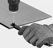 Image of ProductInUse. Locating Pin Down Shown in Use. Front orientation. Drill Bit Guides. Hole-Finding Drill Guides, Locating Pin Down.