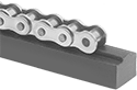 Image of ProductInUse. Front orientation. Roller Chain Guides. Center-Channel Roller Chain Guides.