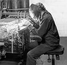 Image of ProductInUse. B (Shown In Use). Front orientation. Stools. Spark- and Heat-Resistant Stools , Style B.