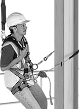 Image of ProductInUse. Lanyard with Position Lock. Front orientation. Travel-Limiting Lanyards. Positioning Travel-Limiting Lanyards, Travel-Limiting Lanyards with Position Lock.