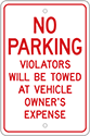Image of Product. Front orientation. Signs. Parking Signs, No Parking—Violators Will Be Towed at Vehicle Owner's Expense (English)—Red Message.